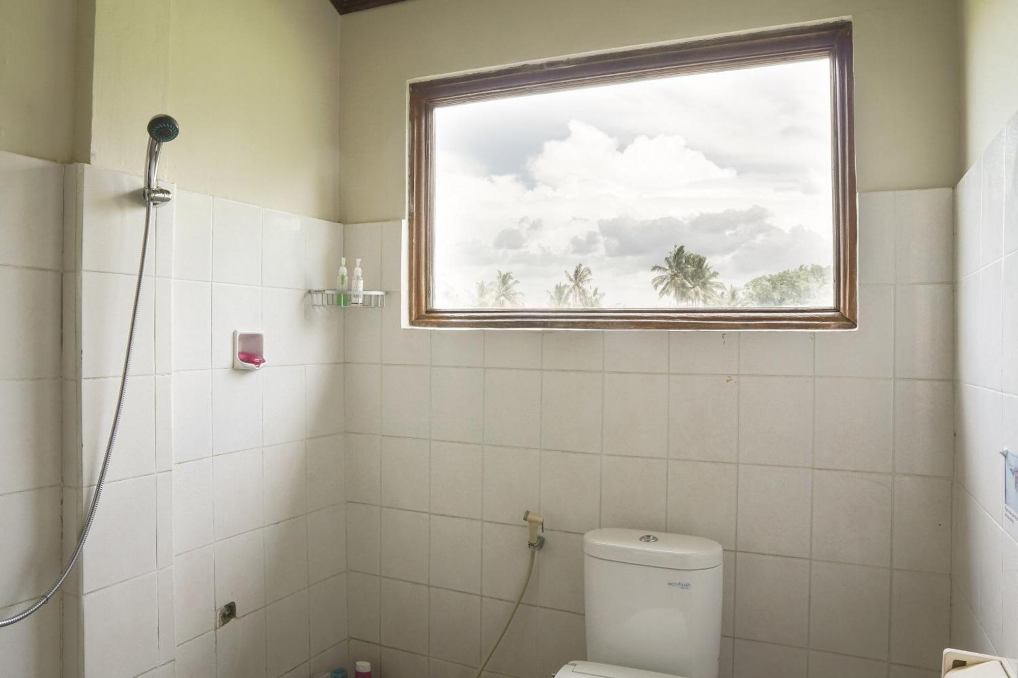 Nirwa 1 Ubud Guesthouse Kamer foto